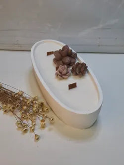 Vela artesanal Ovalada blanca con Mechas de Madera